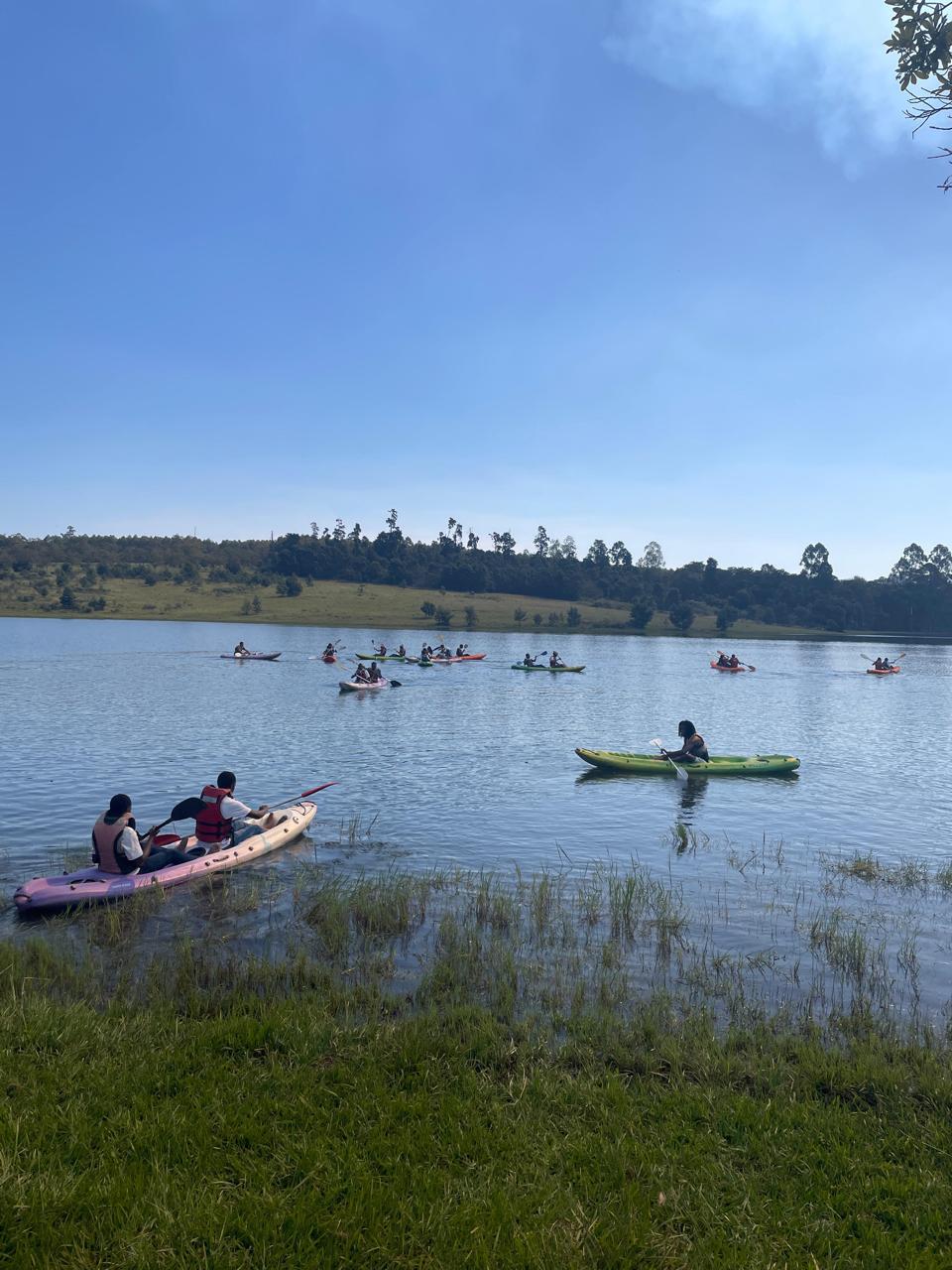Cefups Academy learners kayaking together on a dam
