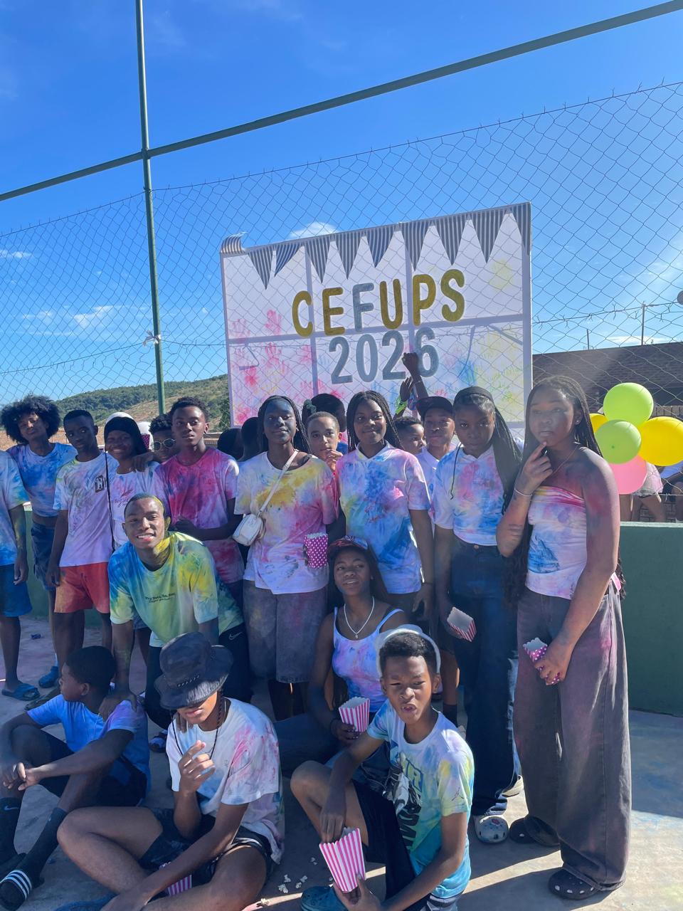 Cefups Academy learners covered in colour powder at the Cefups 2026 board