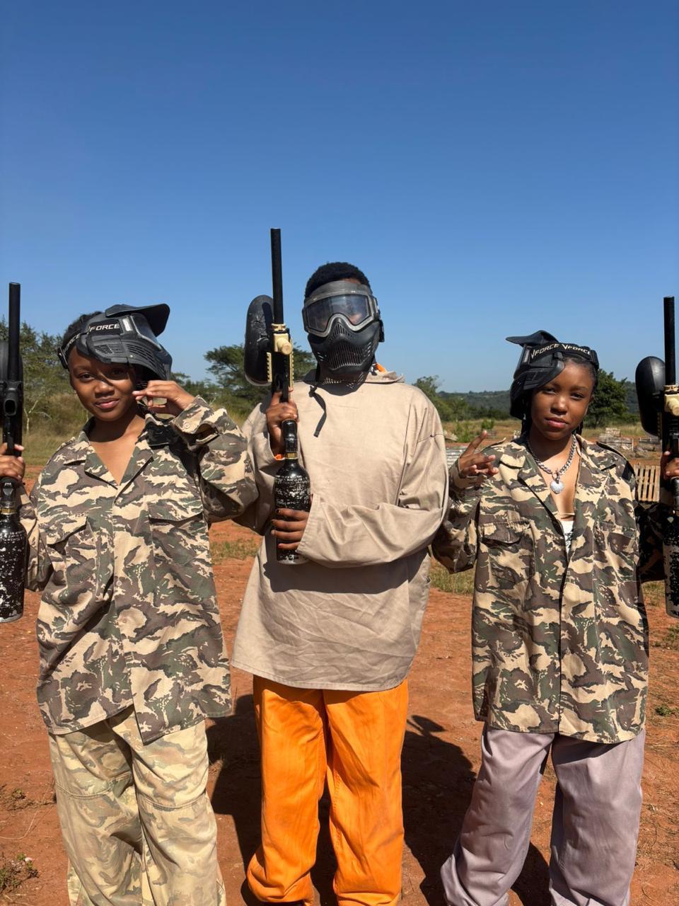 Three Cefups Academy learners in paintball gear holding markers